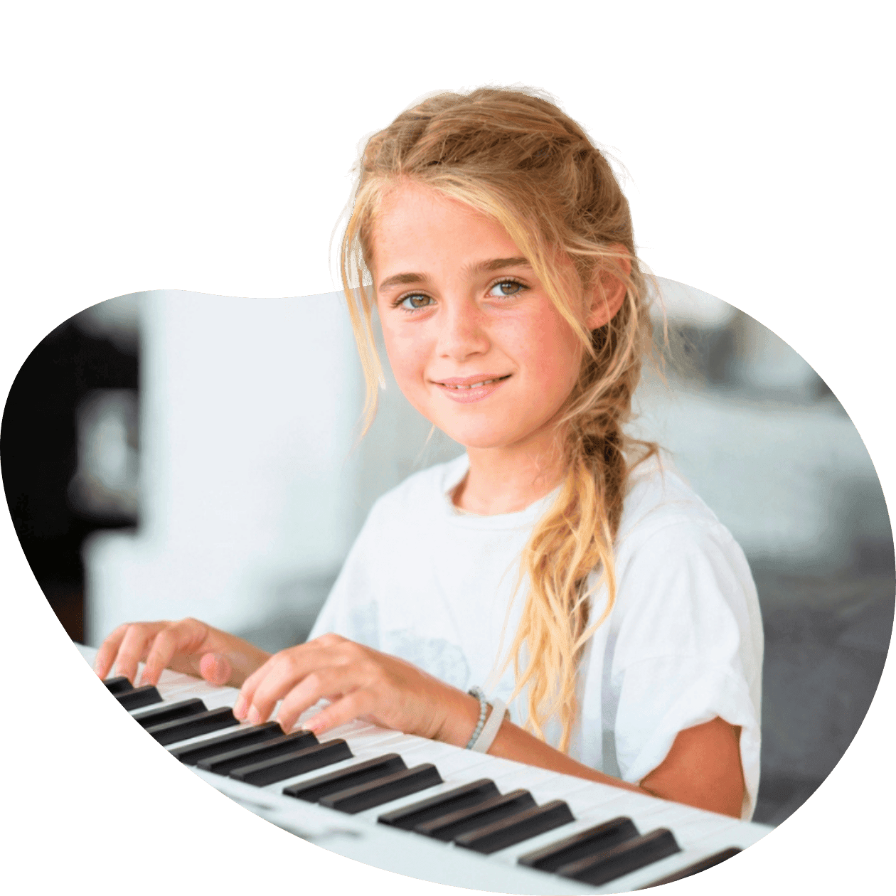 Child playing piano at home